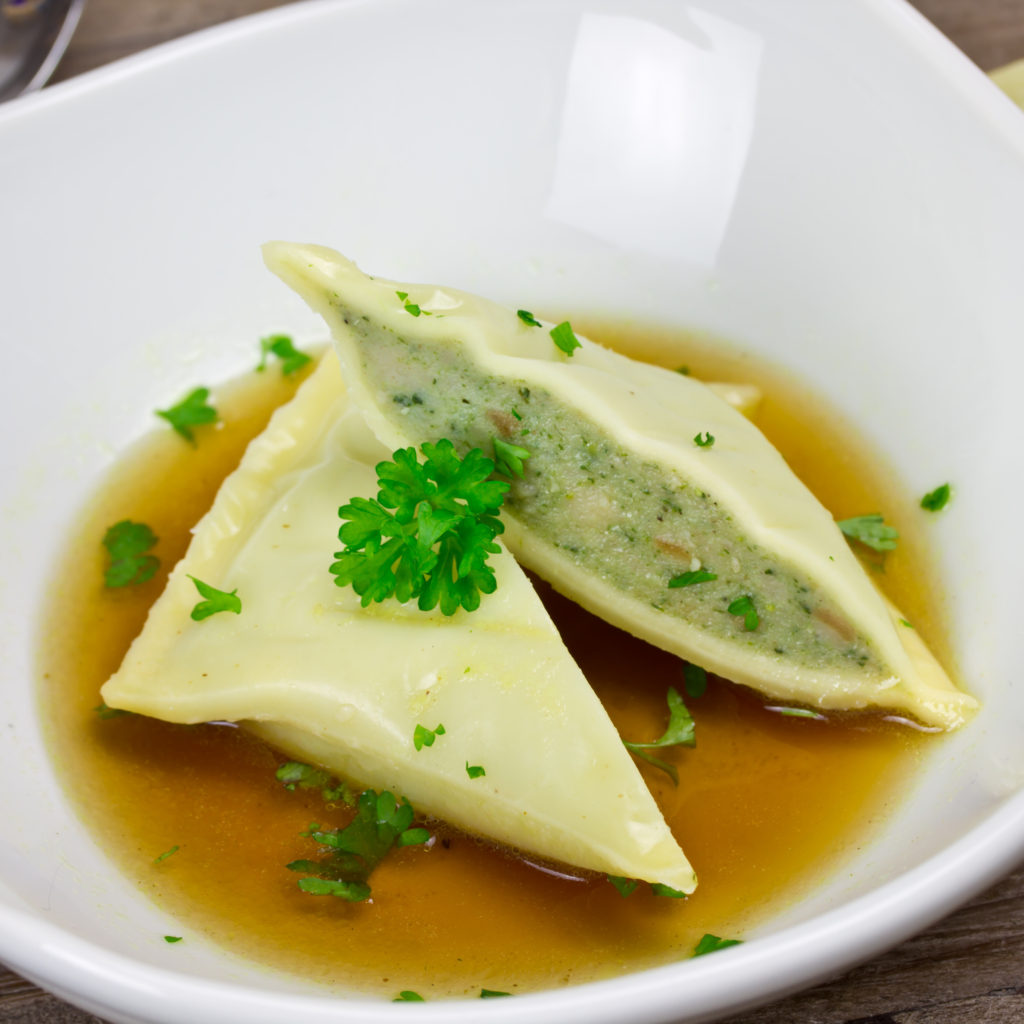Cheese Ravioli with Herbs in Meat Broth