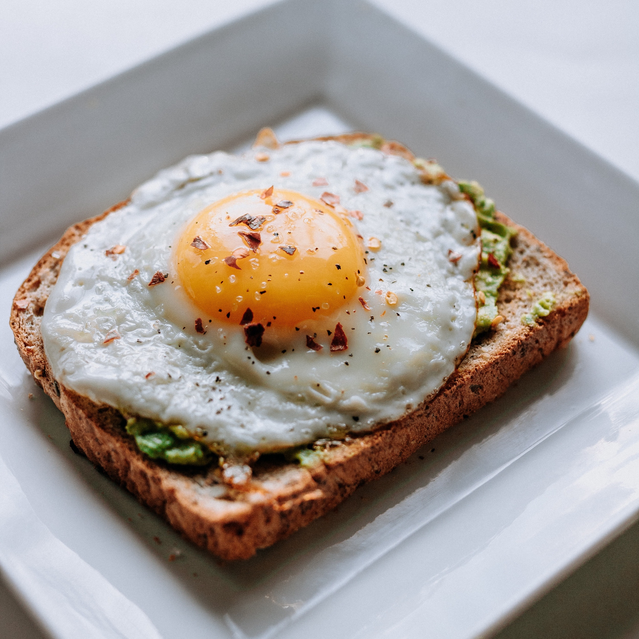 Smashed Avocado Tomato Toast with Poached Egg